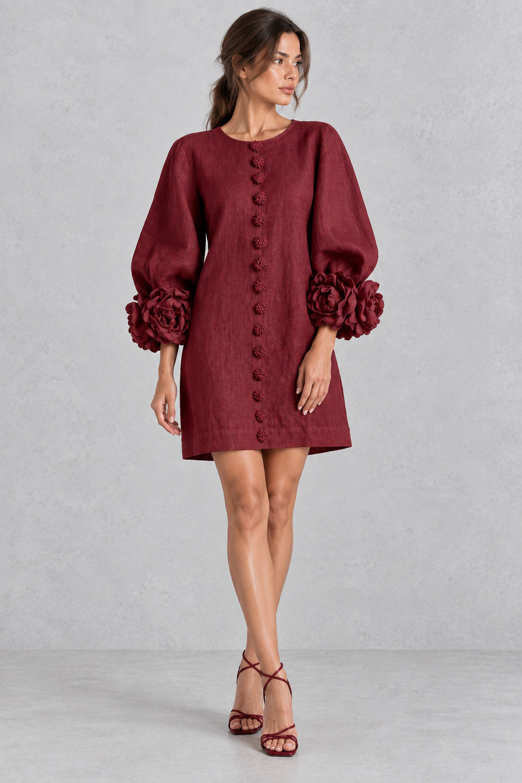 Women’s cotton-linen mini dress with 3D floral detailing, round neckline, long lantern sleeves and a loose A-line silhouette.