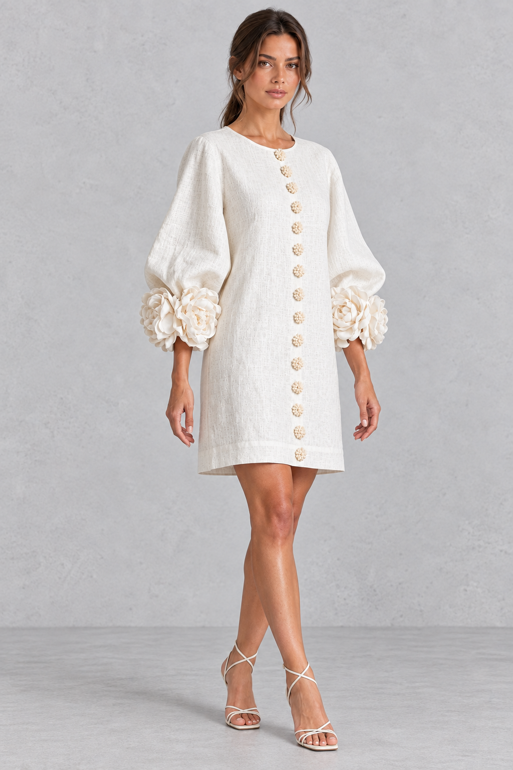 Women’s cotton-linen mini dress with 3D floral detailing, round neckline, long lantern sleeves and a loose A-line silhouette.