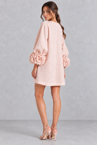 Women’s cotton-linen mini dress with 3D floral detailing, round neckline, long lantern sleeves and a loose A-line silhouette.