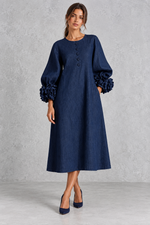 Women’s long dress with 3D floral detailing, round neckline, statement lantern sleeves, button accents and a loose A-line silhouette.