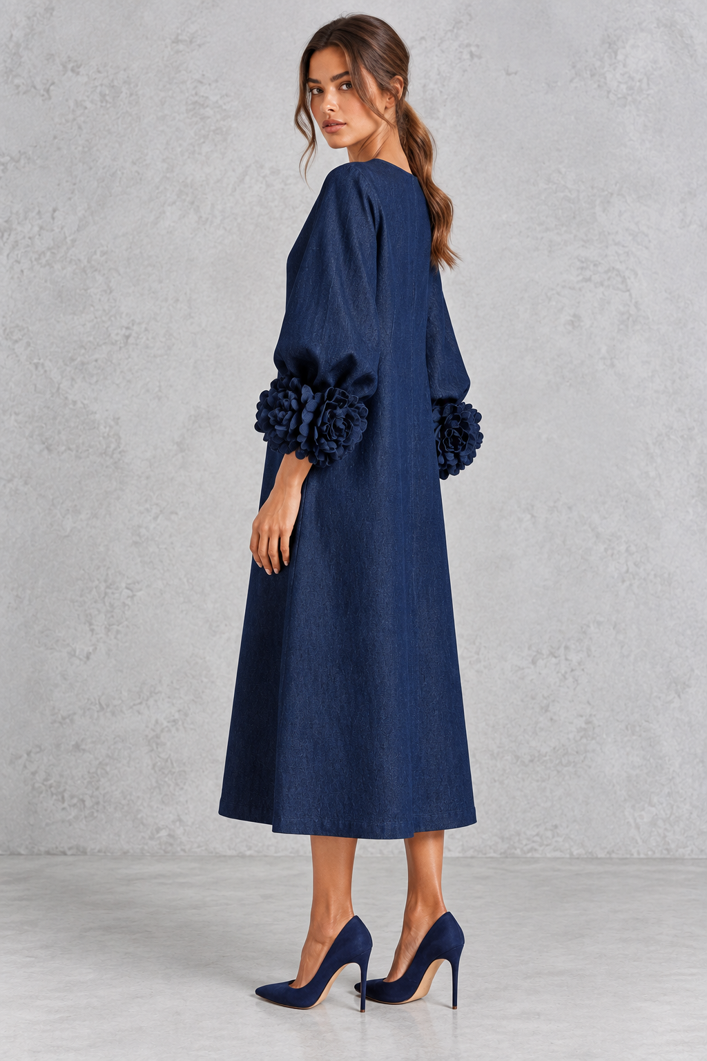 Women’s long dress with 3D floral detailing, round neckline, statement lantern sleeves, button accents and a loose A-line silhouette.