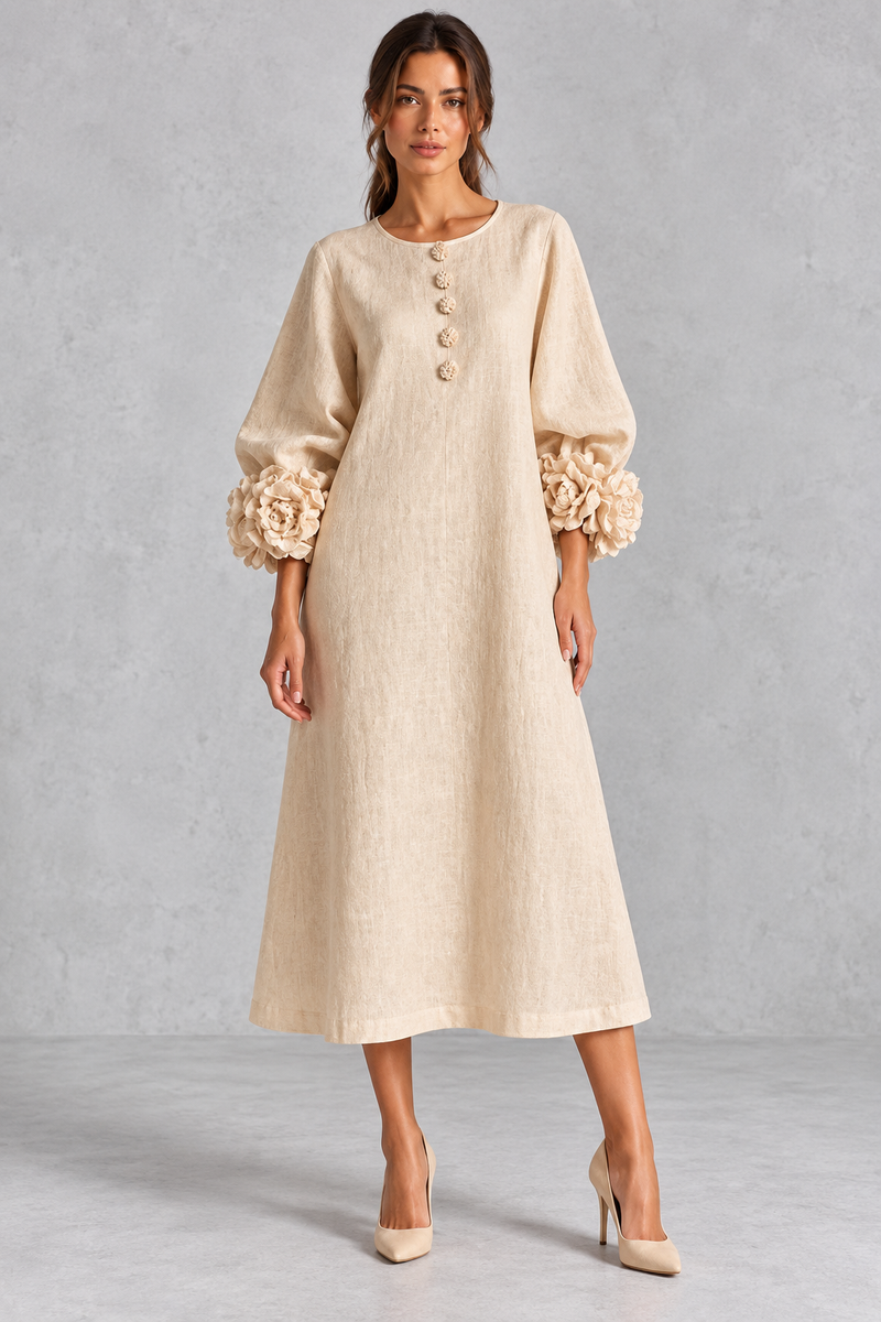 Women’s long dress with 3D floral detailing, round neckline, statement lantern sleeves, button accents and a loose A-line silhouette.