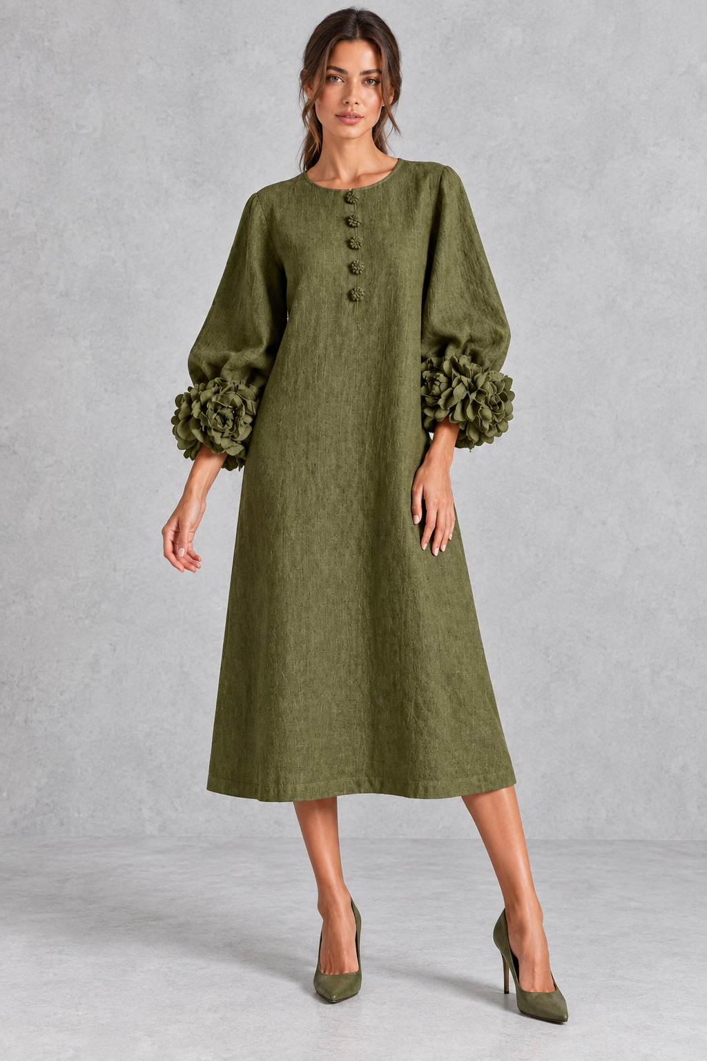 Women’s long dress with 3D floral detailing, round neckline, statement lantern sleeves, button accents and a loose A-line silhouette.