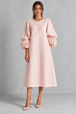 Women’s long dress with 3D floral detailing, round neckline, statement lantern sleeves, button accents and a loose A-line silhouette.