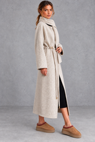 Women's belted wrap coat in Oatmeal – side view