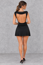 Women’s black draped mini dress with plunging V-neckline, ruched bust, A-line silhouette and statement cowl open back.