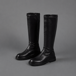 Women’s black faux leather mid-calf boots with pointed toes, low 3 cm heels and inside zip fastening.