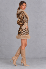Women’s brown leopard print mini dress with a V-neckline, long sleeves, contrast faux fur detailing and a streamlined silhouette.