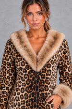 Women’s brown leopard print mini dress with a V-neckline, long sleeves, contrast faux fur detailing and a streamlined silhouette.