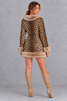 Women’s brown leopard print mini dress with a V-neckline, long sleeves, contrast faux fur detailing and a streamlined silhouette.