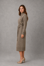 Women’s turtleneck knitted sweater dress with decorative button neckline, long sleeves and adjustable tie waist for autumn and winter.