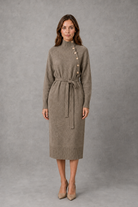Women’s turtleneck knitted sweater dress with decorative button neckline, long sleeves and adjustable tie waist for autumn and winter.