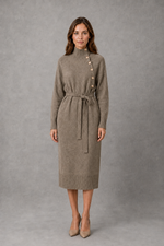 Women’s turtleneck knitted sweater dress with decorative button neckline, long sleeves and adjustable tie waist for autumn and winter.
