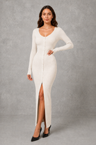 Women’s button front knitted midi dress with a slim-fit bodice, defined waist, princess sleeves and elegant A-line skirt.