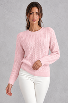 Women's cable-knit round-neck jumper in Pink – front view