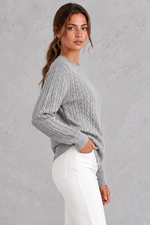 Women's cable-knit round-neck jumper in Grey – side view