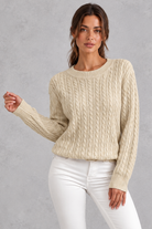 Women's cable-knit round-neck jumper in Oatmeal – front view