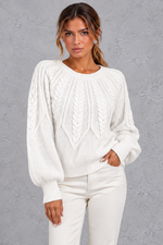 Women's cable-knit round-neck jumper in White – front view