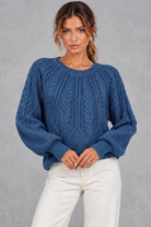 Women's cable-knit round-neck jumper in Denim Blue – front view