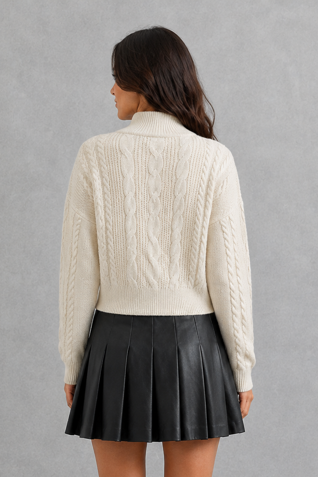 Women’s cable knit cardigan with feminine bow tie front, long sleeves and textured knitted design for autumn and winter layering.