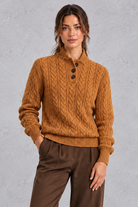 Women's brown cable knit button neck jumper – front view