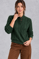 Women's green cable knit button neck jumper – front view