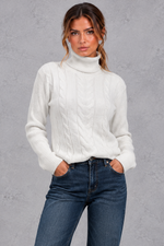 Women's cable knit roll neck jumper in White – front view