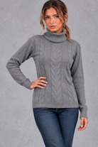 Women's cable knit roll neck jumper in Grey – front view