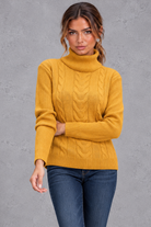 Women's cable knit roll neck jumper in Mustard – front view