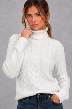 Women's cable knit roll neck jumper in White – front close-up