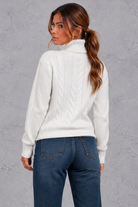Women's cable knit roll neck jumper in White – back view