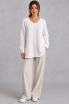 Women's white cable V-neck tunic jumper – full-length view