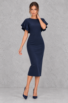 Women’s bodycon midi pencil dress with a round neckline, contrasting check-pattern sleeves, slim fit and elegant midi silhouette.