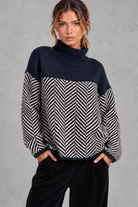 Women's chevron knit mock neck jumper in Navy – front view