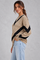 Women’s chevron knit crew neck jumper with a bold V-shaped pattern, dropped shoulders, long sleeves and ribbed trims.