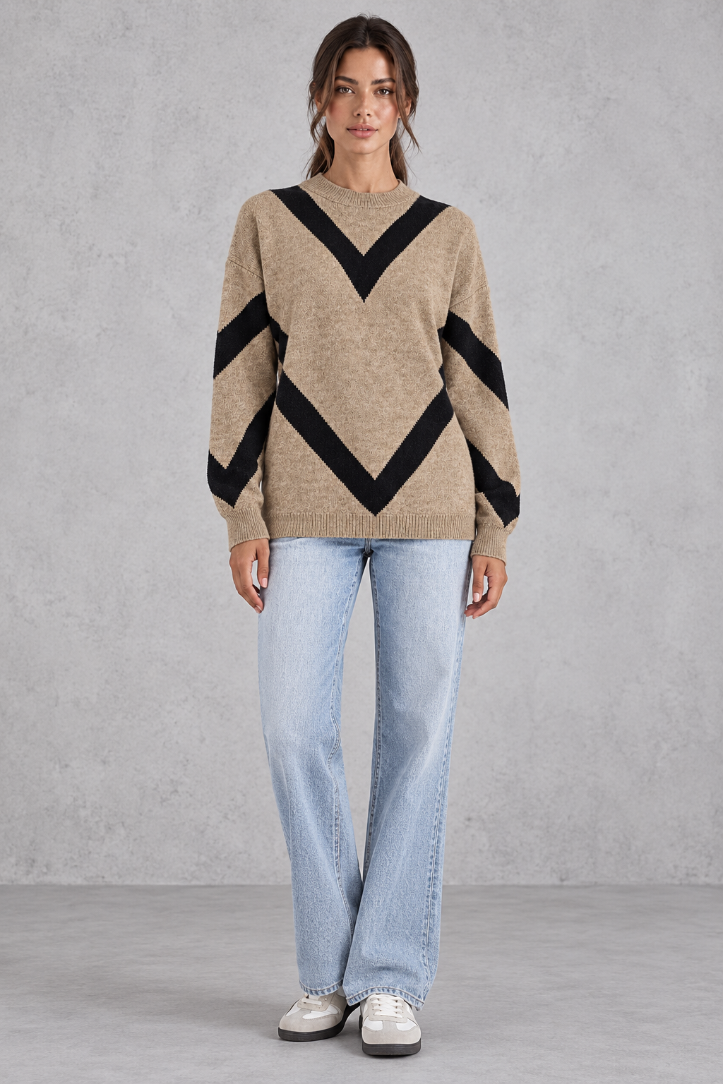 Women’s chevron knit crew neck jumper with a bold V-shaped pattern, dropped shoulders, long sleeves and ribbed trims.
