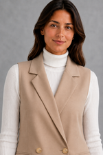 Women’s coffee brown sleeveless longline blazer with notch lapels, double-breasted button fastening, defined waist and flap pockets.