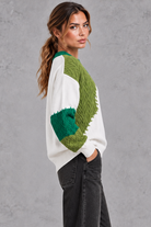 Women's patchwork cable knit jumper in Green – side view