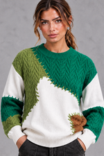 Women's patchwork cable knit jumper in Green – front close-up