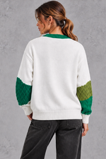 Women's patchwork cable knit jumper in Green – back view