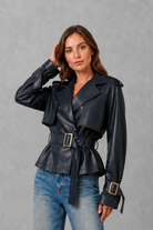 Women’s cotton short trench jacket with double-breasted button front, notch lapels, long sleeves and adjustable belted waist.