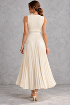 Women's cream ribbed top and flowing pleated maxi skirt set – back view