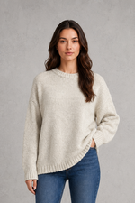 Light grey women’s crew neck knit jumper with an oversized relaxed fit, dropped shoulders and loose wide long sleeves.