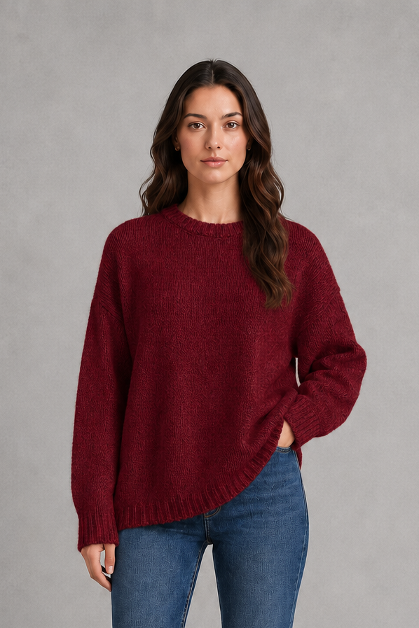 Light grey women’s crew neck knit jumper with an oversized relaxed fit, dropped shoulders and loose wide long sleeves.