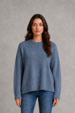 Light grey women’s crew neck knit jumper with an oversized relaxed fit, dropped shoulders and loose wide long sleeves.