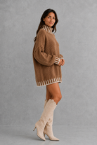 Women’s crew neck knit with long sleeves and a comfortable regular fit, crafted from a soft cotton and polyester blend.