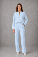Women’s cropped V-neck jacket and high-waisted cigarette trouser two-piece set with chest patch pockets and a smart casual tailored silhouette.