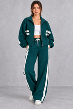 Women's green cropped track jacket and wide leg drawstring jogger set – front view