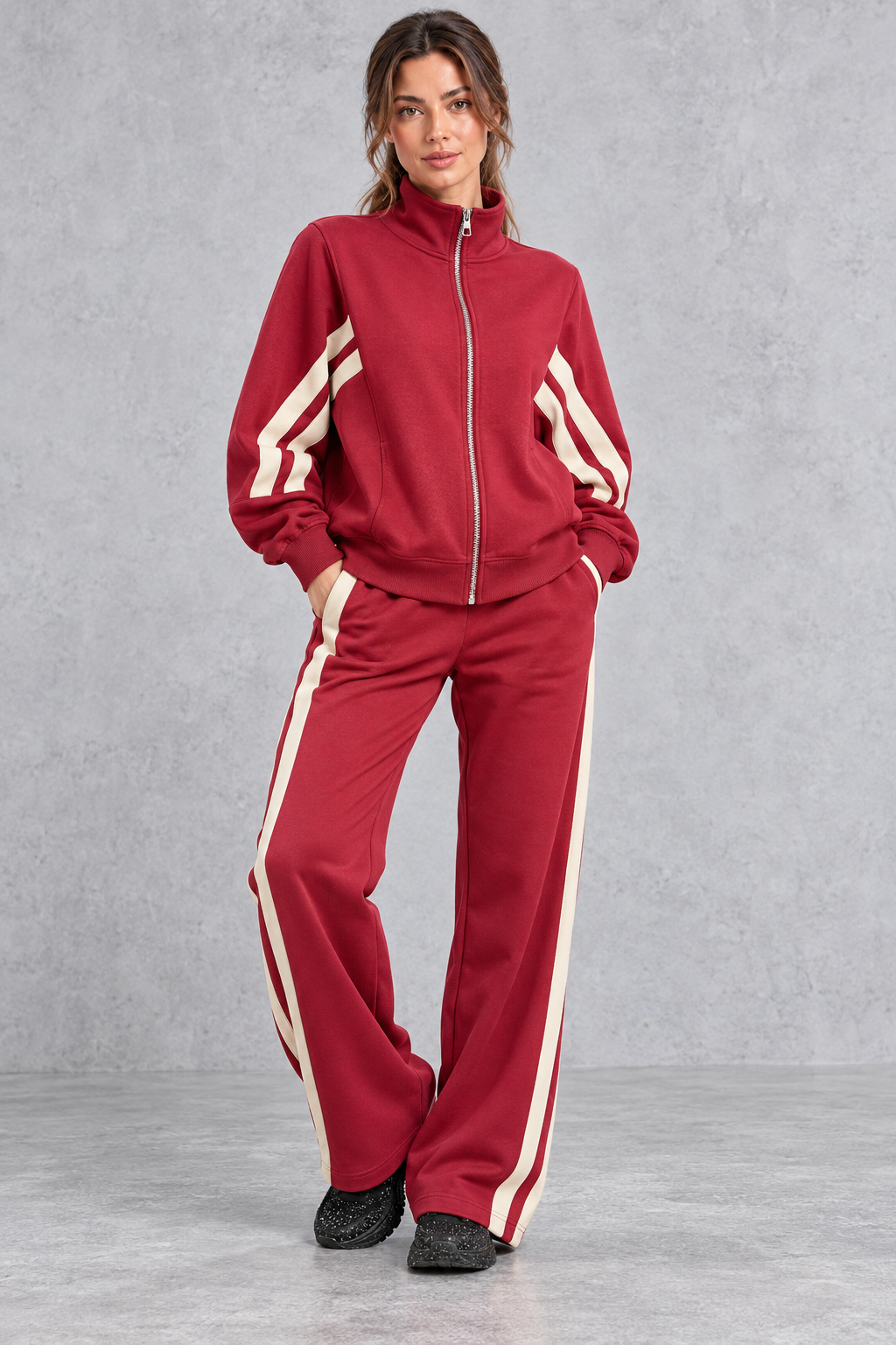 Women's red zip-up tracksuit set with cream side stripes – front view
