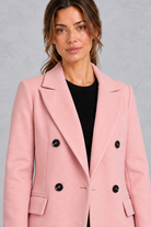 Women's double-breasted longline coat in Pink – close-up view
